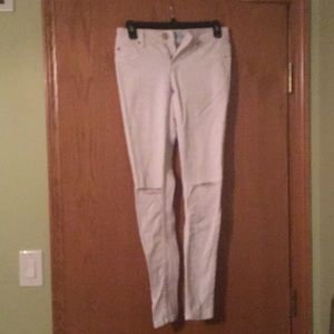 White pants with knee holes